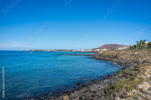 Skiathos coastline with clear blue sky photo
