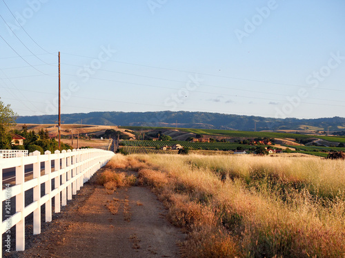 White picket fence at sunset on Greenville Road at Tesla Road, Livermore Wine Country, California