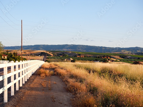 White picket fence at sunset on Greenville Road at Tesla Road, Livermore Wine Country, California