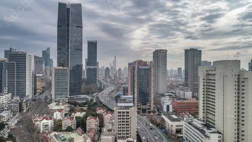 Aerial view of highway and buildings in West Yan`an road, Shanghai city on a cloudy day