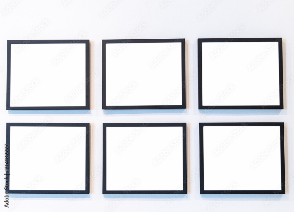 Black frame photo on wall with bank screen. Black frame photo on wall with bank screen.