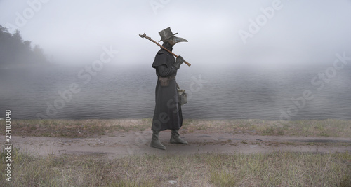 Reconstruction of the medieval scene: the plague doctor on the way photo