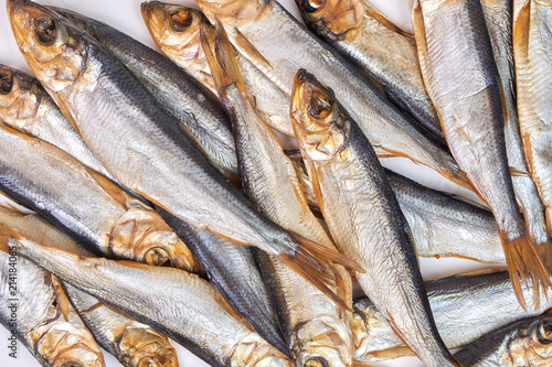 Smoked fish Baltic herring as background image © Serhii