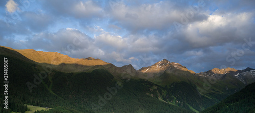 morgendliches alpenglühen in den bergen in tirol photo