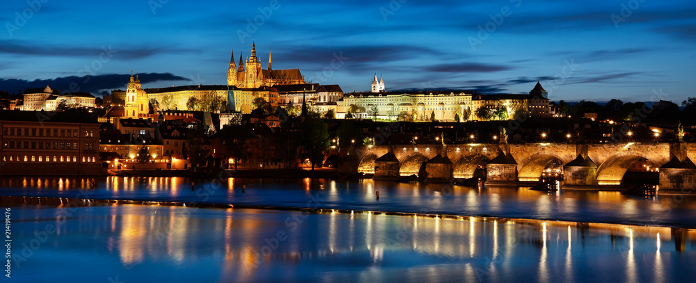 View to Prague castle across Vltava river, beautiful evening panorama