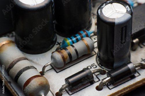 Resistor, Capacitor and Diode on Circuit Board close up. electronic hardware photo