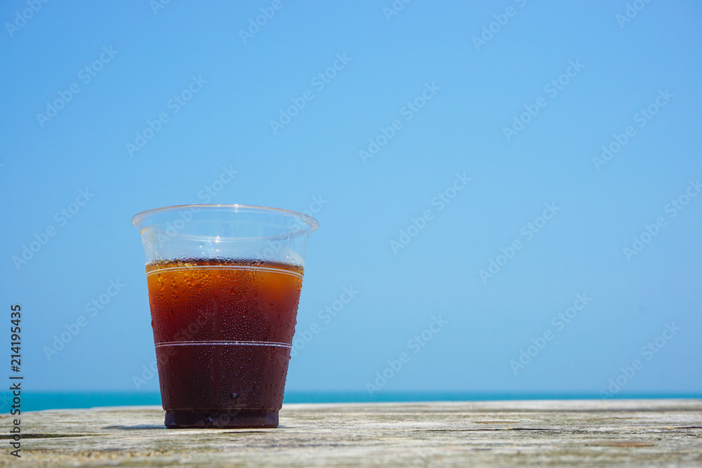 Iced coffee to drink on the beach. ビーチで飲むアイスコーヒー Iced coffee to drink on the beach. ビーチで飲むアイスコーヒー