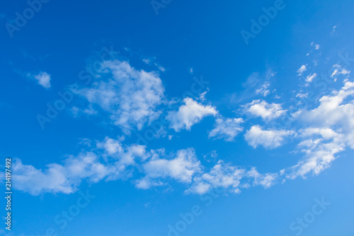 altocumulus clouds on blue sky background