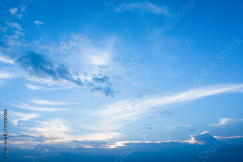cirrus clouds on blue sky background.