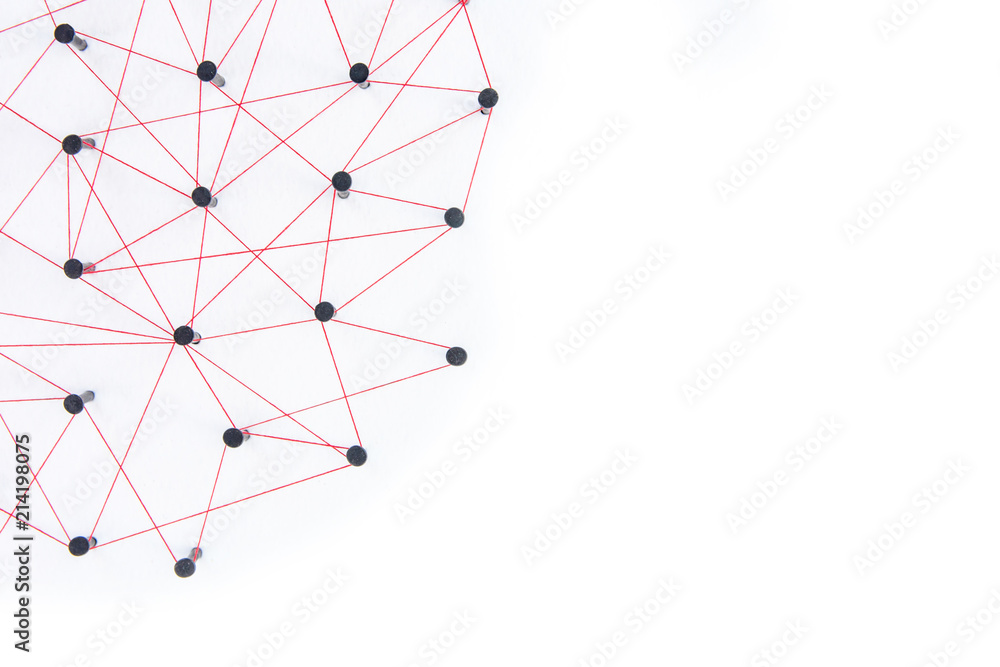 Connecting networks concept - network connected with yarn red on white paper with copy space. Simulator connection social media, internet, people communication, Linking entities Connecting networks concept - network connected with yarn red on white paper with copy space. Simulator connection social media, internet, people communication, Linking entities