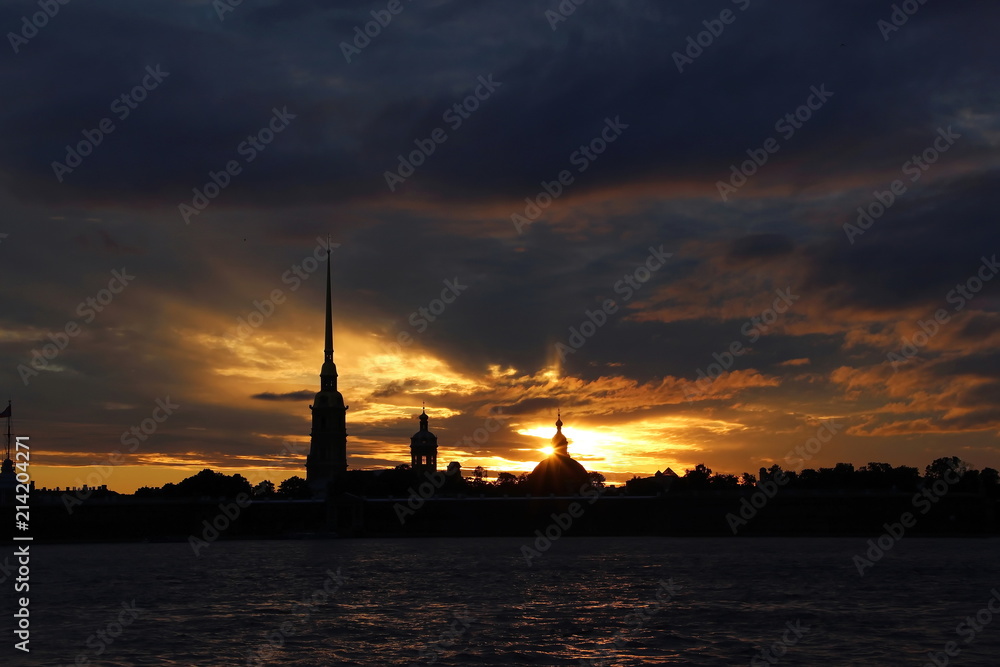 Sunset over the Peter and Paul Fortress in St. Petersburg. Twilight Sunset over the Peter and Paul Fortress in St. Petersburg. Twilight