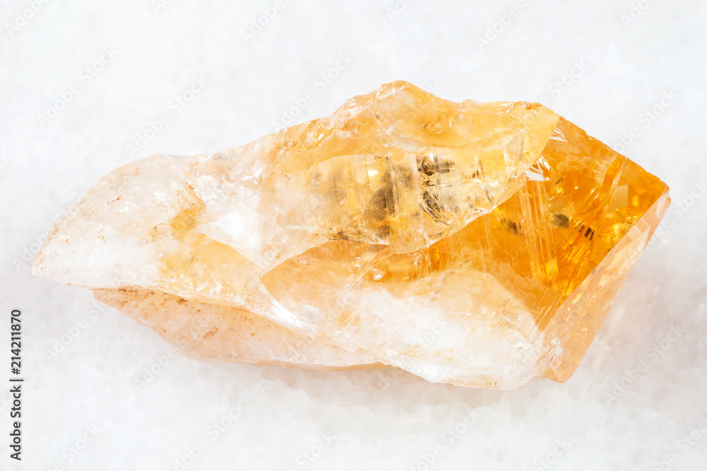 rough crystal of Citrine (yellow quartz) on white rough crystal of Citrine (yellow quartz) on white