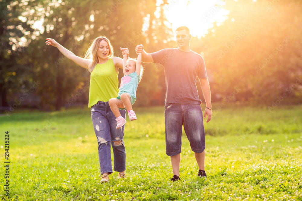 Fototapeta premium Family with children enjoying in park.