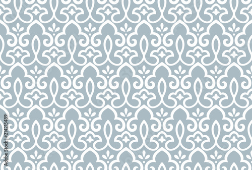 Wallpaper in the style of Baroque. Seamless vector background. White and blue floral ornament. Graphic pattern for fabric, wallpaper, packaging. Ornate Damask flower ornament