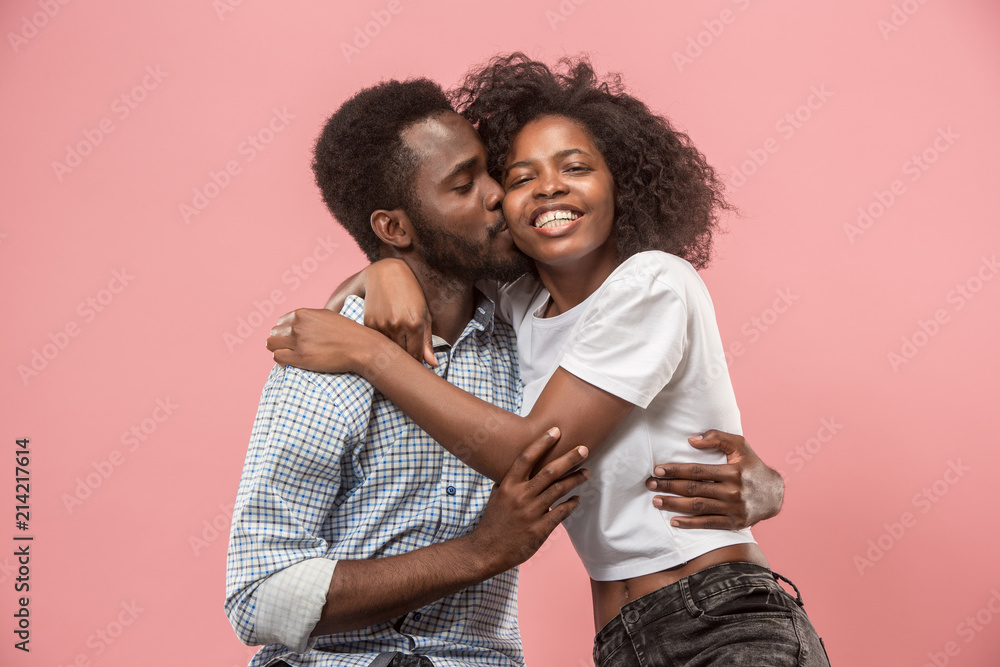 Couple watching sports match on tv at home, celebrating victory, successful game Couple watching sports match on tv at home, celebrating victory, successful game