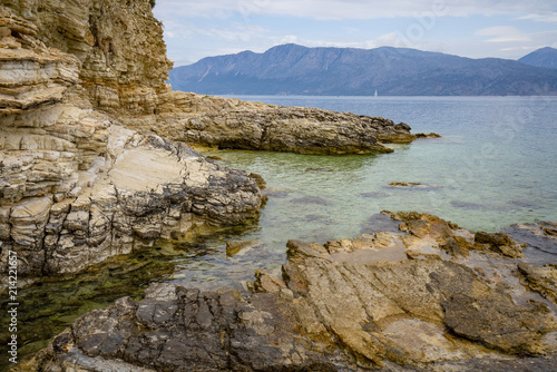 Desimi Beach Golf and nearby Island with clear water in Greece