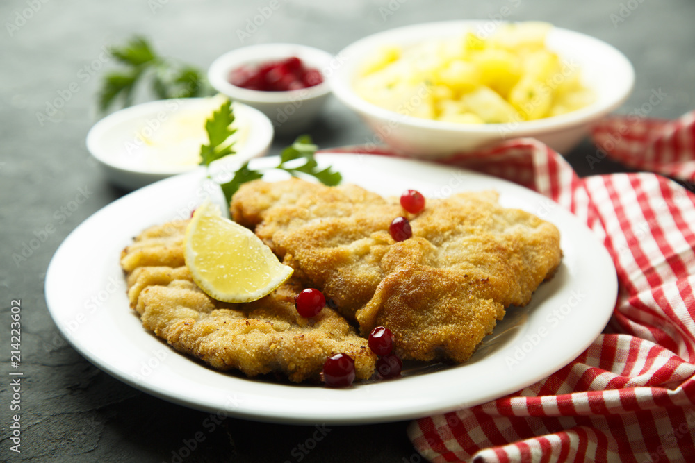 Classic Wiener Schnitzel with potato salad Classic Wiener Schnitzel with potato salad
