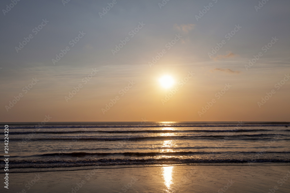 Beautiful sunrise over the tropical beach in Bali Indonesia Beautiful sunrise over the tropical beach in Bali Indonesia