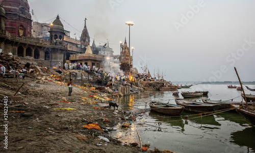 Hindu cremation ceremony at Manikarnika Ghat on banks of holy Ganges river at Varanasi Uttar Pradesh India