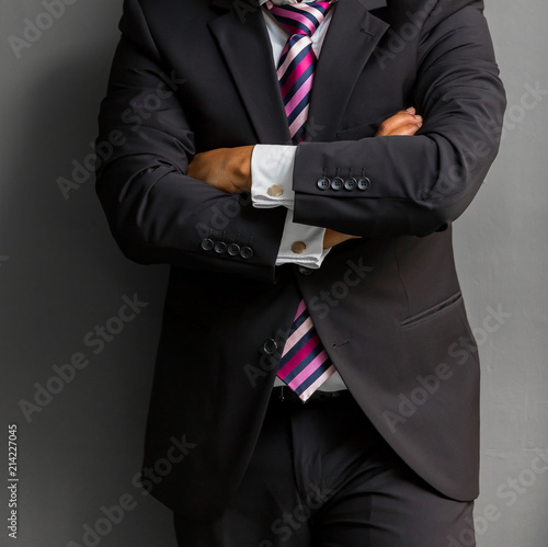 African Black hands and arms of businessman in a suit