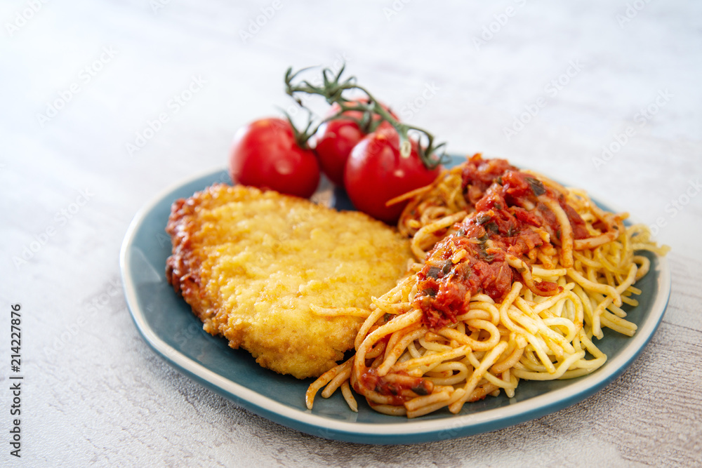 Escalope of spaghetti with tomatoes sauce and basil Escalope of spaghetti with tomatoes sauce and basil