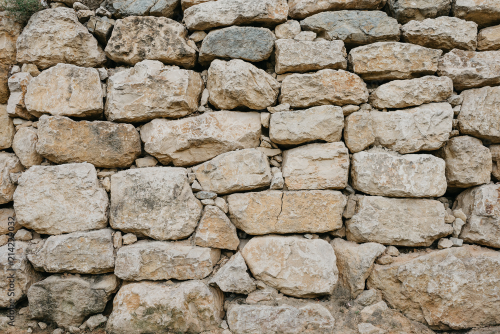 Wall of the ancient sandy stones in Spain Wall of the ancient sandy stones in Spain