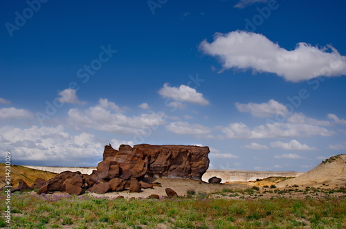 West Kazakhstan. In the boundless steppe there is a lonely mountain complex Shirkala, which from a distance looks like a Yurt.