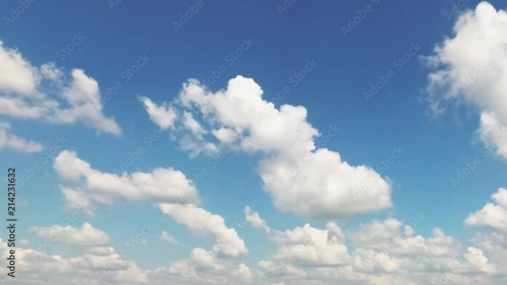 mottled clouds floating on a blue sky. mottled clouds floating on a blue sky.