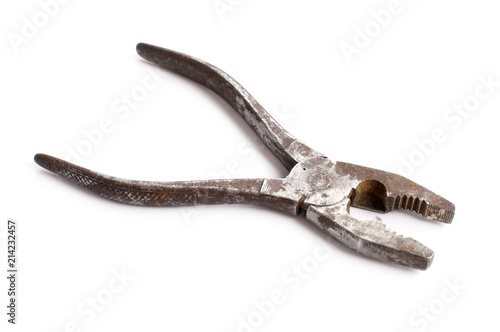 Old rusty pliers on white background.