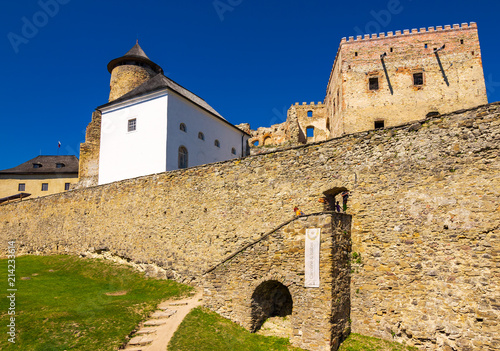 Stara Lubovna, Slovakia - AUG 28, 2016: stone walls of Stara Lubovna castle. popular tourist destination. Bright sunny day with deep blue sky photo