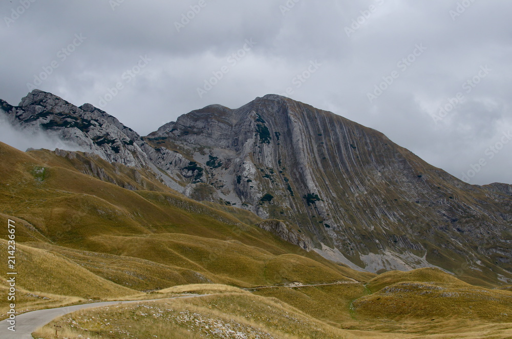 The road passing in the mountains of Montenegro in cloudy weather
