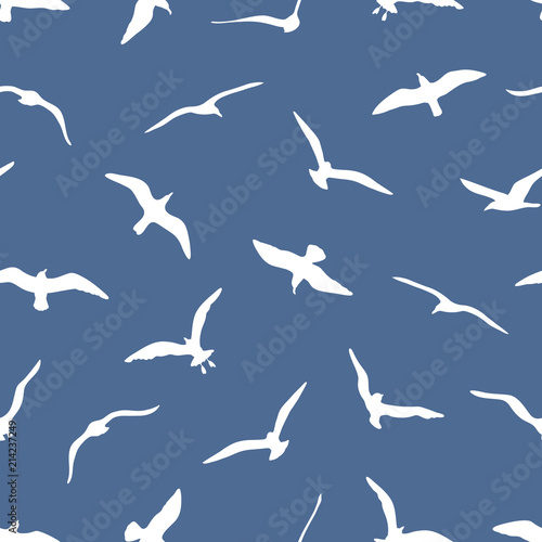 seamless pattern with gulls on blue background