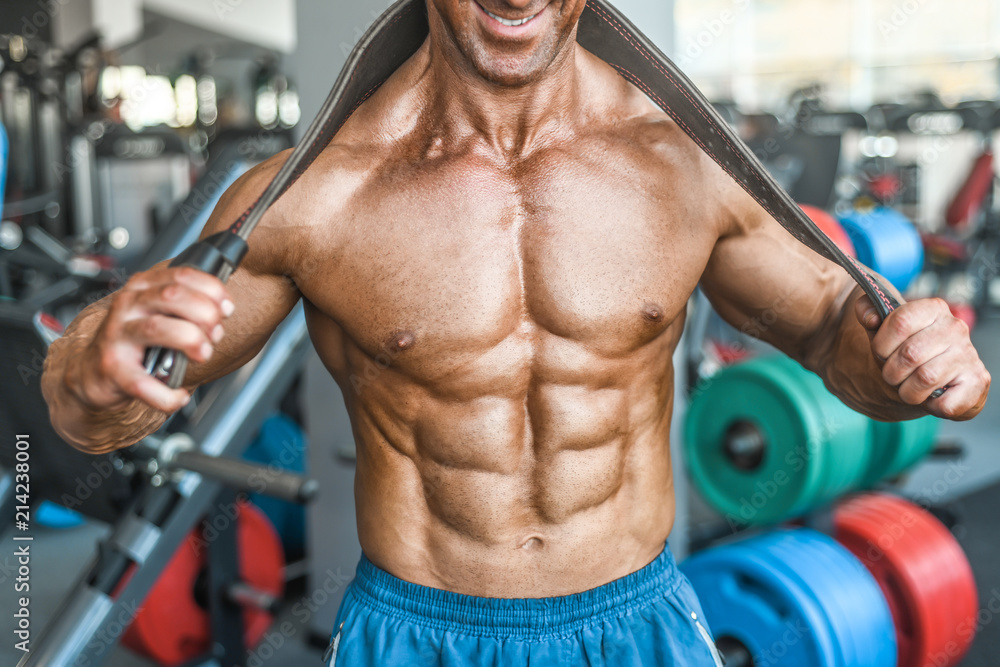 Brutal aged strong bodybuilder athletic men pumping up muscles with dumbbells Brutal aged strong bodybuilder athletic men pumping up muscles with dumbbells