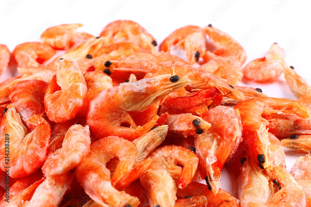 Frozen fresh shrimp on white background (isolated). Snack to beer. Close up Frozen fresh shrimp on white background (isolated). Snack to beer. Close up