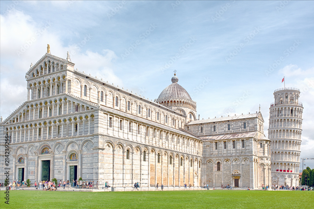 View from the Piazza del Duomo on the Cathedral of Pisa and the leaning tower of Pisa.