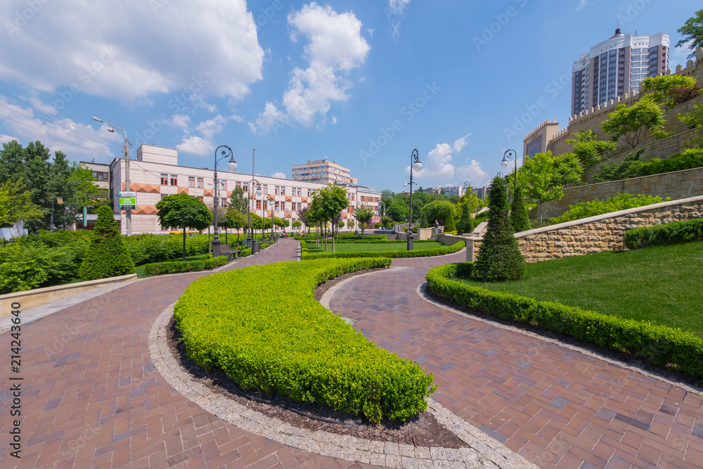 Fototapeta premium The intertwining of small boulevards between which grows green grass