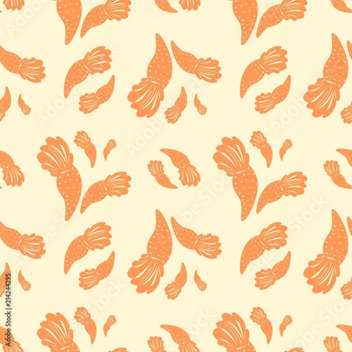 Seamless pattern of orange carrot on the yellow bakcground