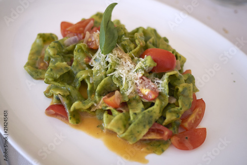 Tagliatelle pasta with fresh tomatoes and parmesan cheese