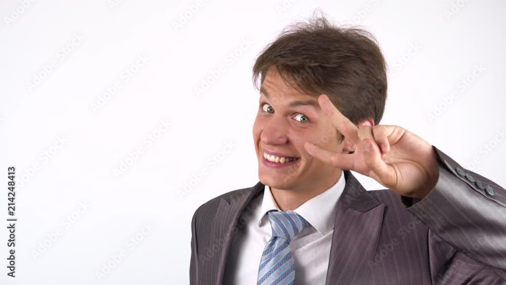 Sign of Victory By Businessman on white Background Sign of Victory By Businessman on white Background