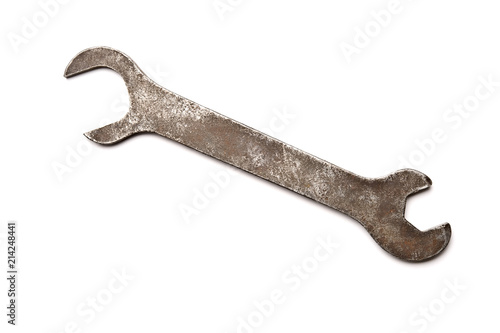 Old wrench isolated on white background.