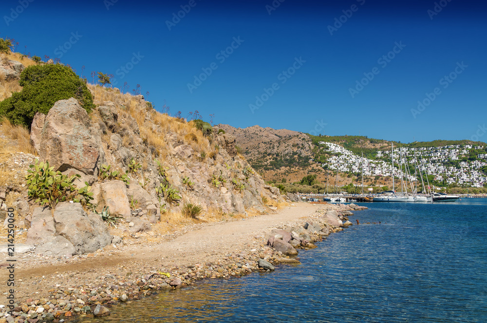 Fototapeta premium Sunny view of the beach at Ortakent near Bodrum, Mugla, Turkey.