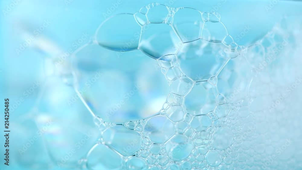 Foam. Soap foam popping bubbles background. Foam macro structure closeup. Washing concept. Slow motion 4K UHD video 3840x2160 Foam. Soap foam popping bubbles background. Foam macro structure closeup. Washing concept. Slow motion 4K UHD video 3840x2160