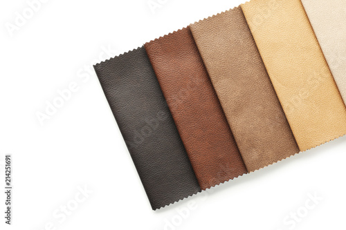 Leather samples of different colors for interior design on white background
