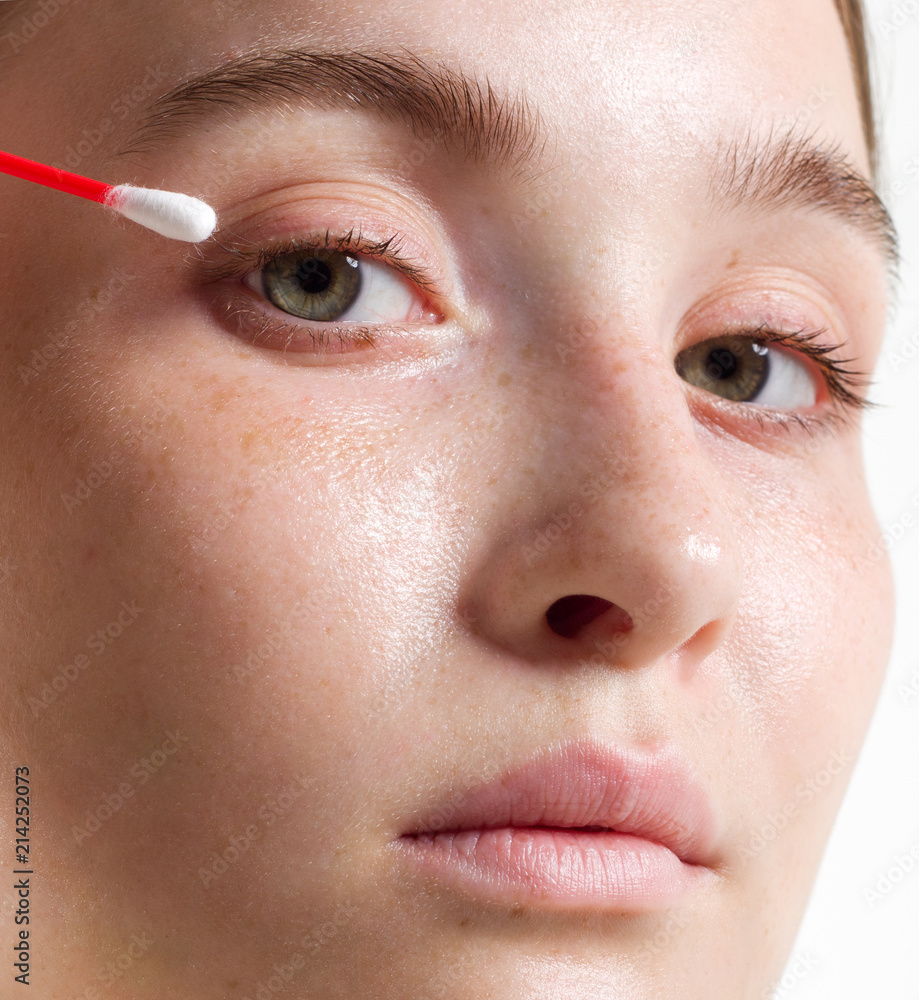 Fototapeta premium Beautiful portrait of the young woman close up. Natural beauty, ideal skin, natural cosmetics. Cosmetology, Spa procedures, health, care of skin