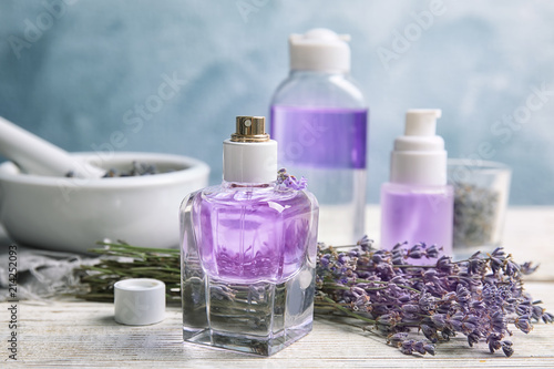Fototapeta Naklejka Na Ścianę i Meble -  Composition with lavender flowers and natural cosmetic on table