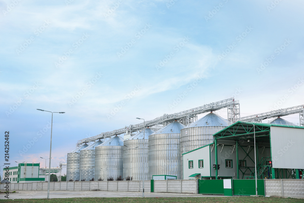 Row of modern granaries for storing cereal grains Row of modern granaries for storing cereal grains