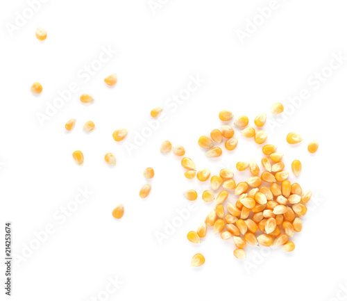 Raw corn kernels on white background. Healthy grains and cereals