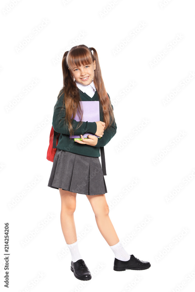 Little girl in stylish school uniform on white background Little girl in stylish school uniform on white background
