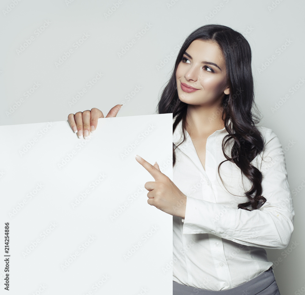 Smiling business lady with white empty board background with copy space for Business lady Smiling business lady with white empty board background with copy space for Business lady