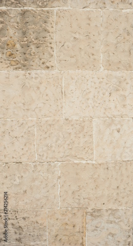 Stone wall texture for design. Part of the wall of the ancient castle as a texture.